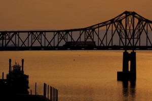 The Spirit of Peoria Riverboat docked along the shore of the Illinois River at the base of the Murray Baker Bridge along the revitalized Peoria Riverfront District.