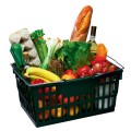 Grocery basket full of fruits, vegetables, bread, wine
