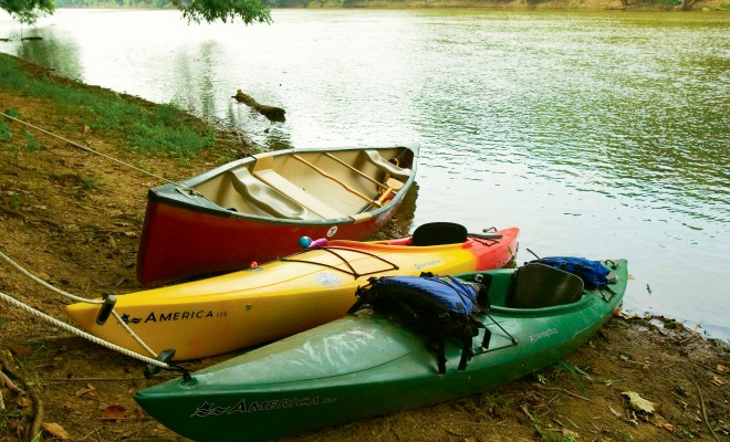 kayaks on the bank of a lake