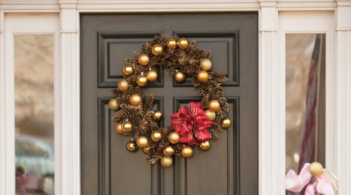 A pinecone wreath made on a wreath ring and spraypainted gold.
