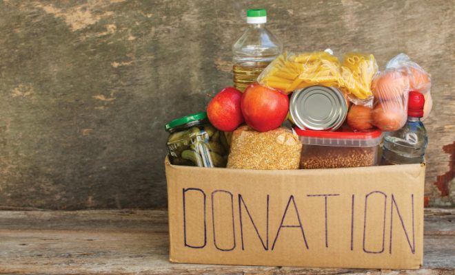 food donation box with canned and dry goods inside