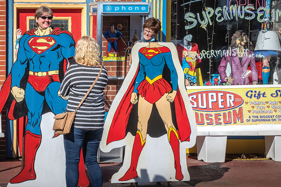 Visitors take photos in front of the Super Museum in Metropolis, Illinois. 