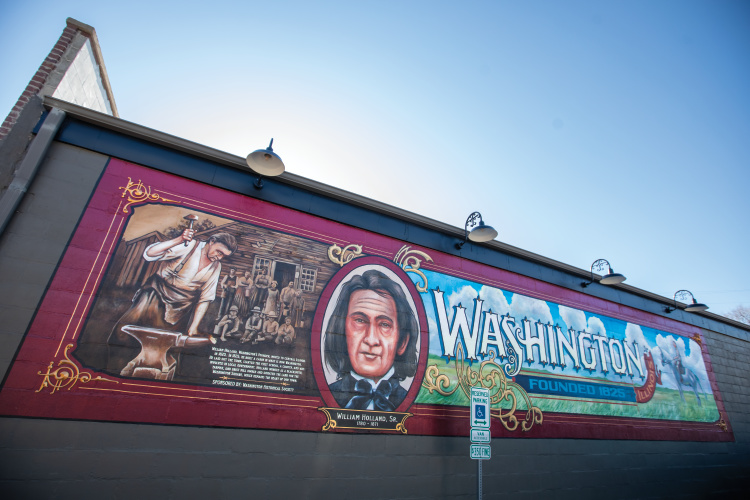 A mural welcomes visitors downtown