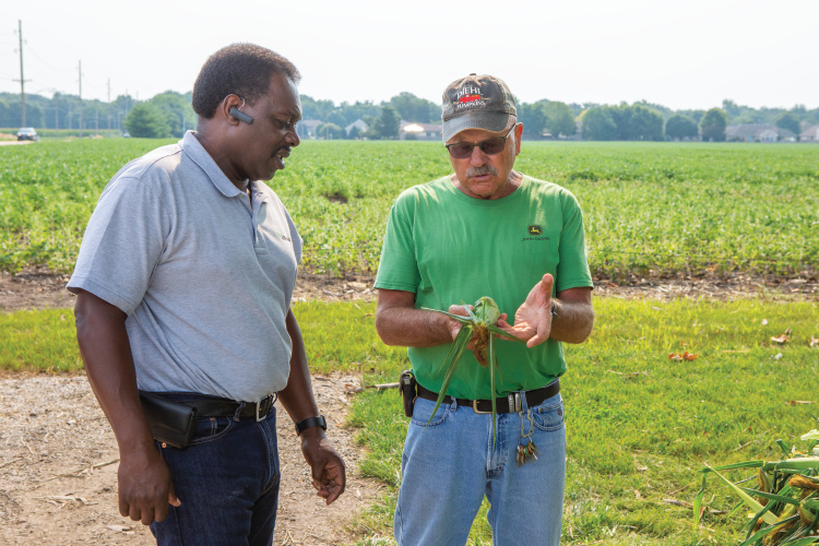 Norm Diehl talks with a customer