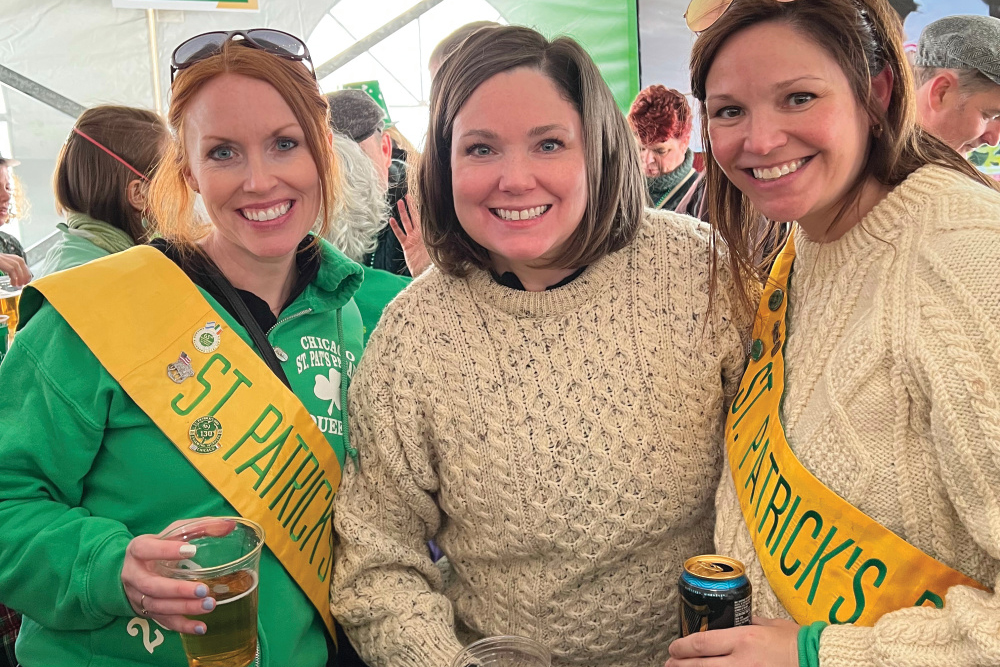 Three wome in St. Patrick's attire at Shamrock'n the Block
