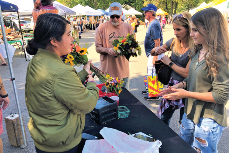 Flower booth at the Farmers Market+ at The Dole