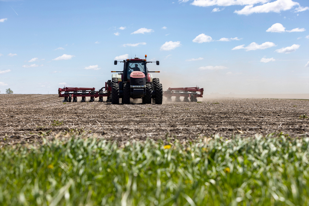 A tractor planting