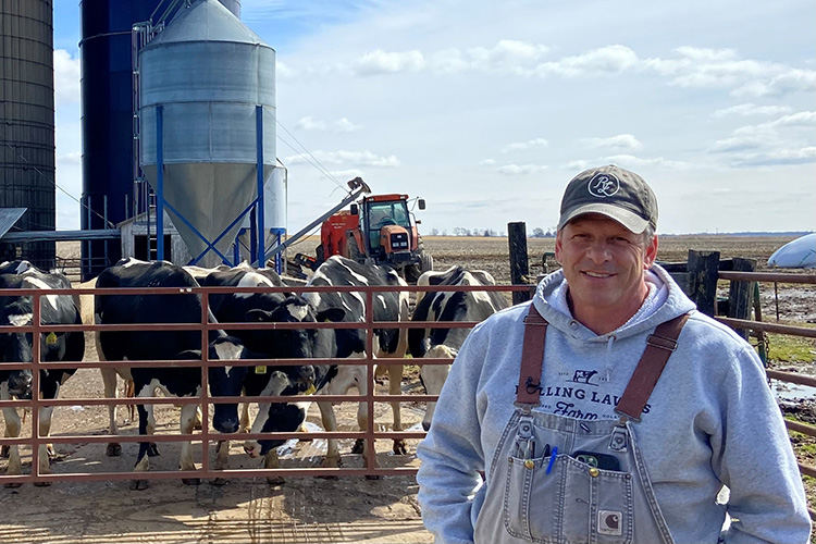 Michael Turley with cows on his farm