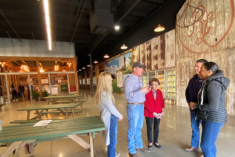 Illinois Lt. Governor and the Turley family during the tour
