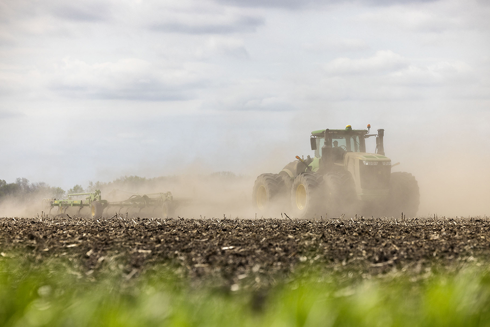 Tractor works up the ground for planting