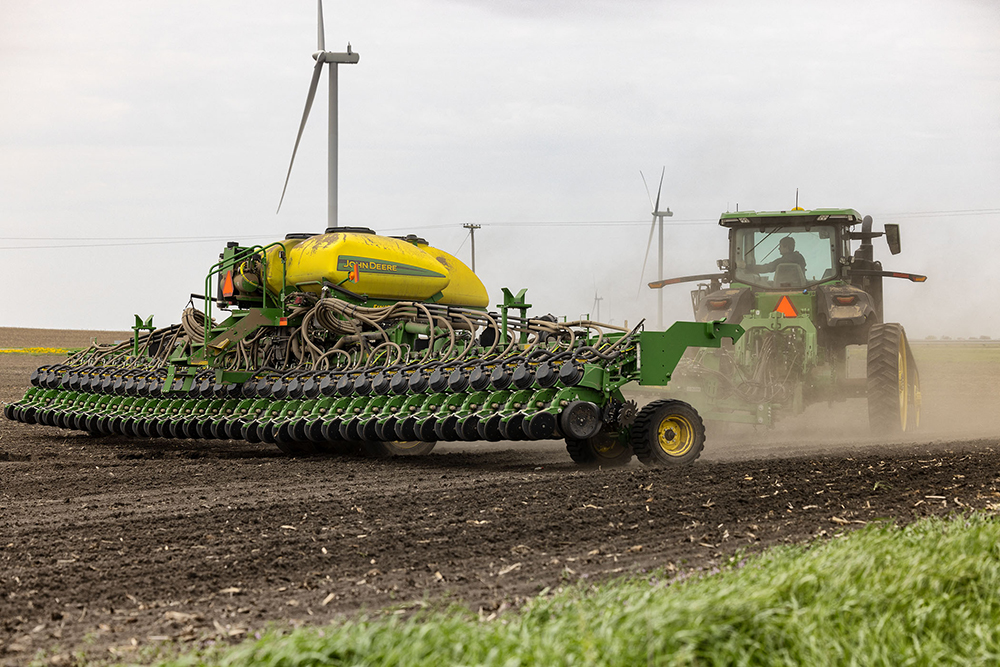 Up-close of a tractor planting