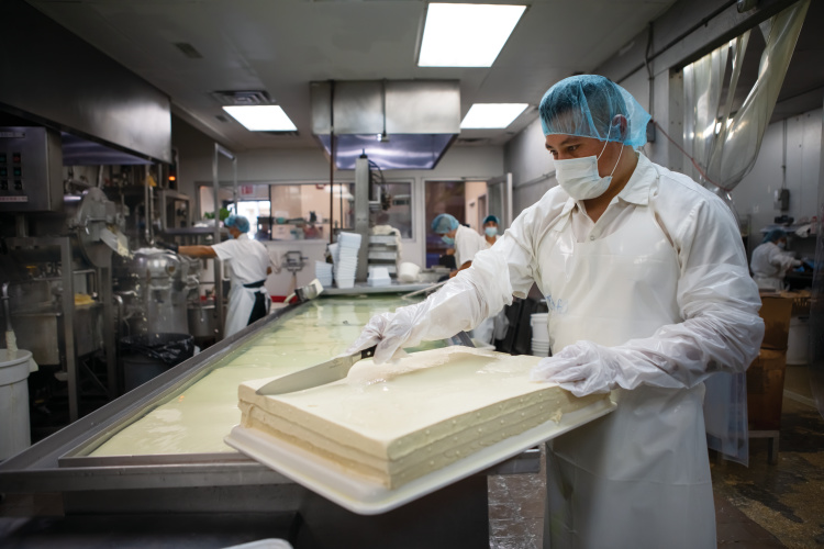 Finished tofu being cut