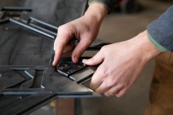 Nicolas Burke test fits the parts of a custom design