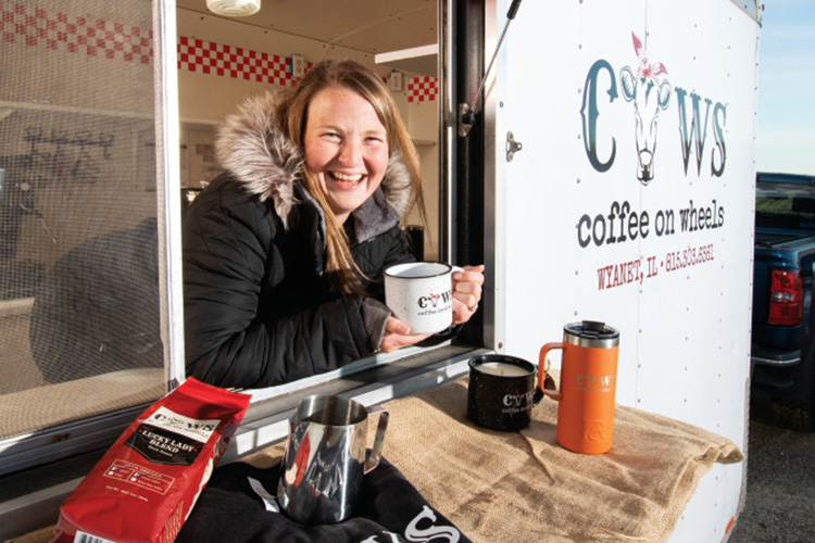 Katlyn Sanden leans out the window of her mobile coffee stand, Coffee on Wheels