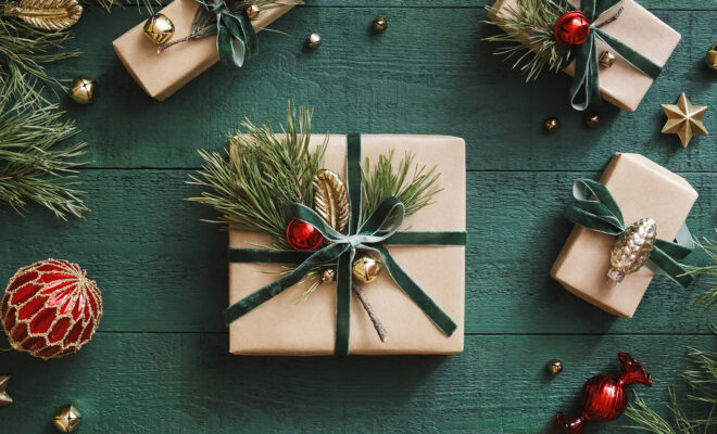 High angle view of Christmas present wrapped in kraft paper; Illinois gift guide