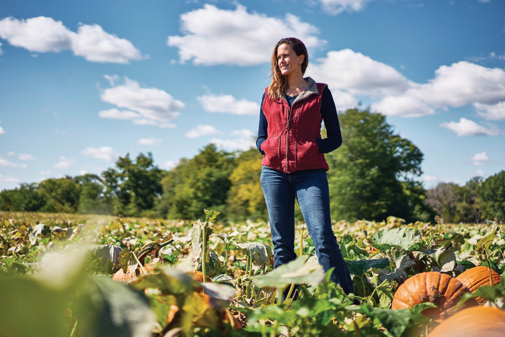 Heather Dollinger in a field at Dollinger Family Farm