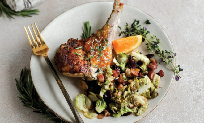 Garlic-Rosemary Crusted Crown Roast of Pork with Warm Brussels Sprouts Salad
