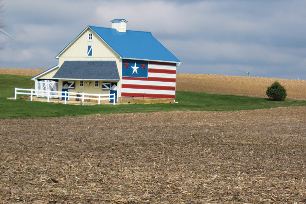 Barn with a flag painted on the side 