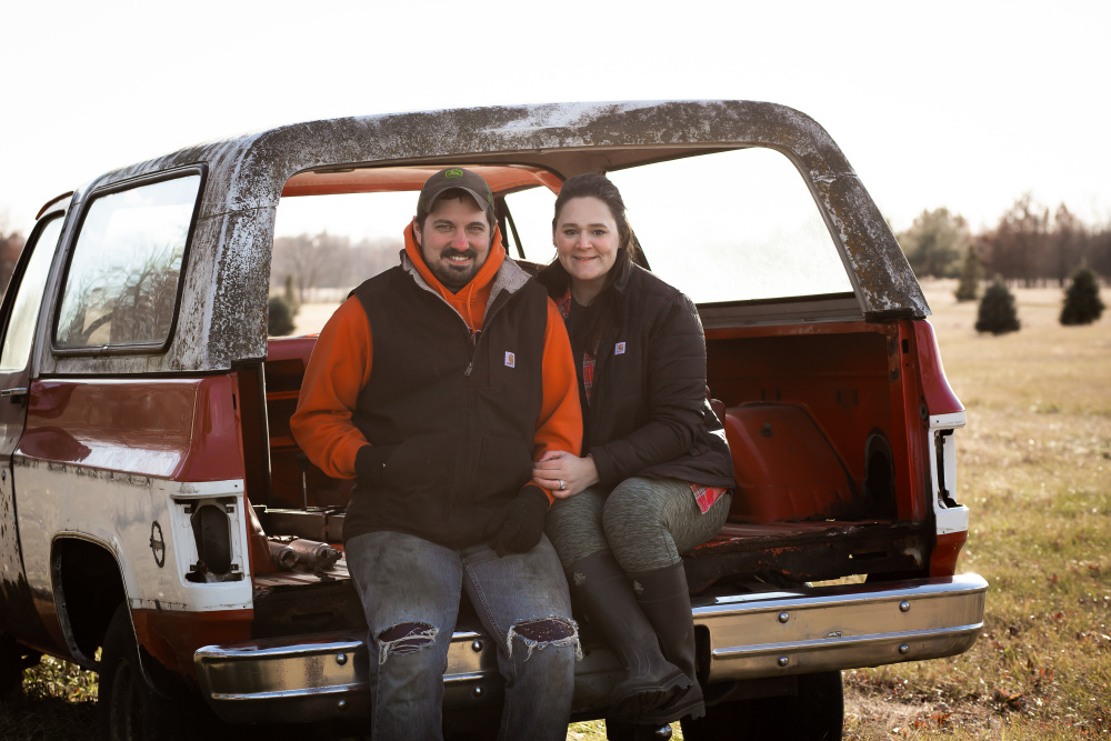 Sadie Asher and her husband, Shane, on their farm near Geneseo, Illinois. Sadie gives tips for finding hands-on experiences for kids interested in ag.