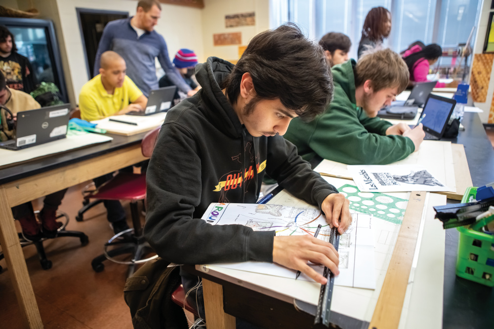 Ricardo Cervantes works on project drafting different styles of gardens. 