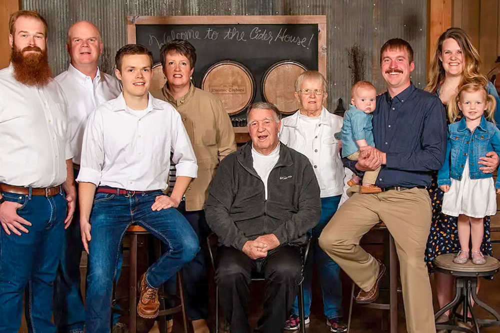 From left to right, Max McArtor, Kevin McArtor, Jake McArtor, Denice McArtor, Jerry McArtor, Mary Lynn McArtor, Mike Spychal holding Cal, Jenna and Amy Spychal. Jerry and Mary Lynn started the orchard in 1984. (Photos courtesy of Jonamac Orchard)