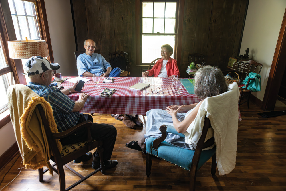 Gerald McWorter and Kate Williams-McWorter sitting at a table with Phillip Bradshaw and Carol McCartney