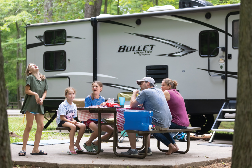A farmily camping at Sam Parr State Fish and Wildlife Area in Newton