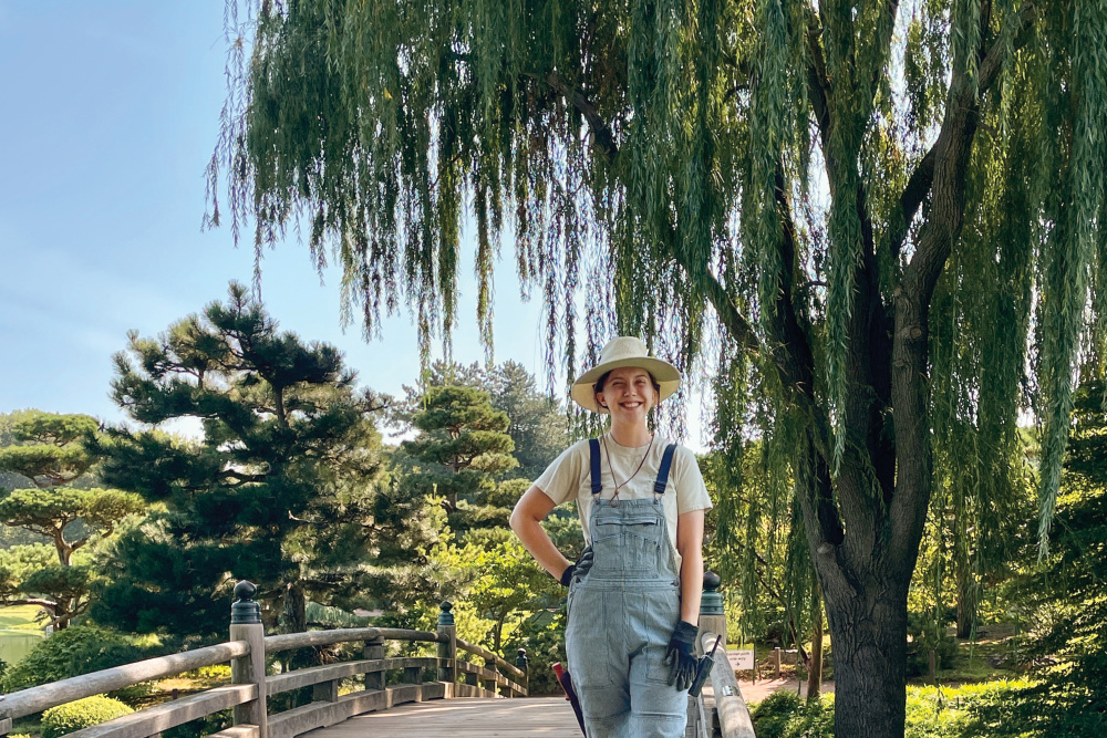 Veronica Laurent standing on a bridge at the Chicago Botanic Garden