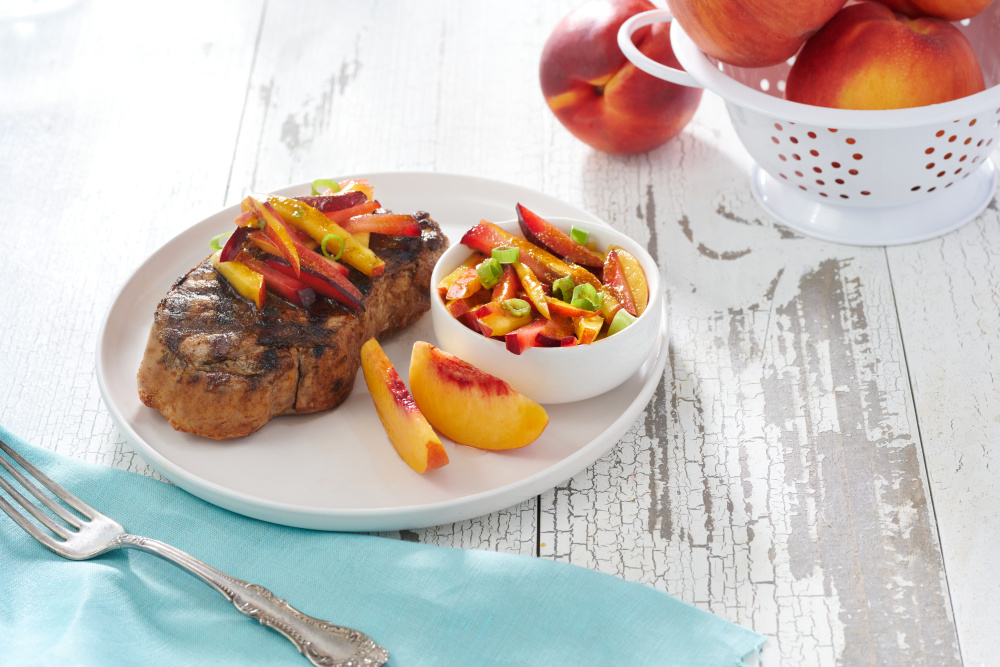 Grilled Pork Chops with Summer Stone Fruit Slaw