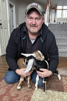 Brad Dearing with baby goats