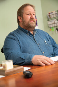 Bill Pauling sitting at a desk