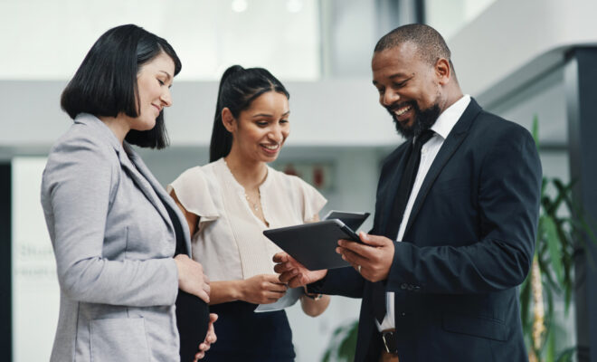 Three people in a discussion