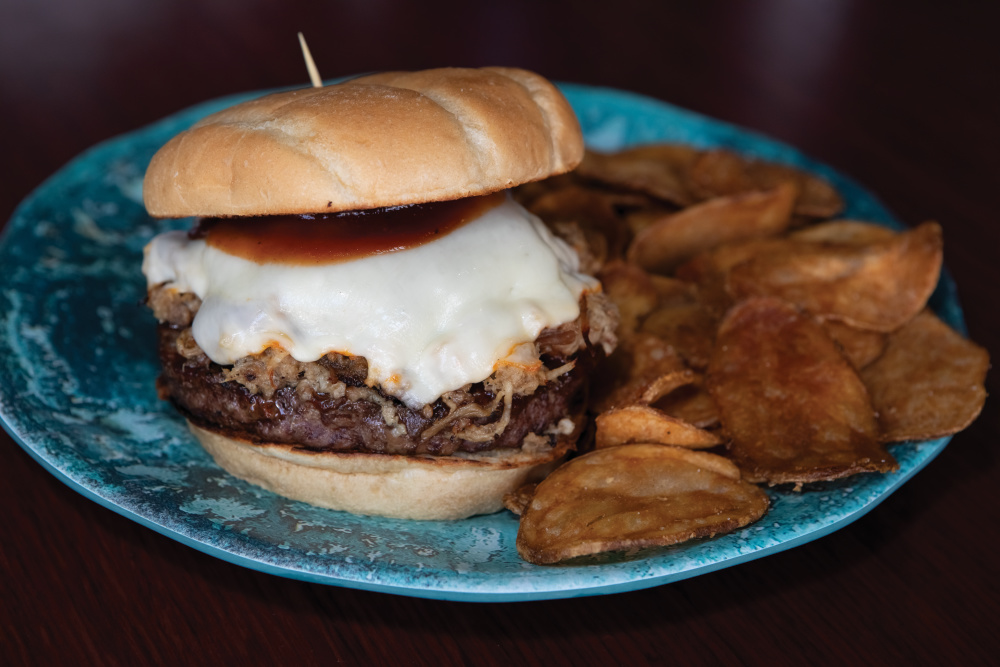 A BBQ Topped Burger and house made kettle chips from The Silo