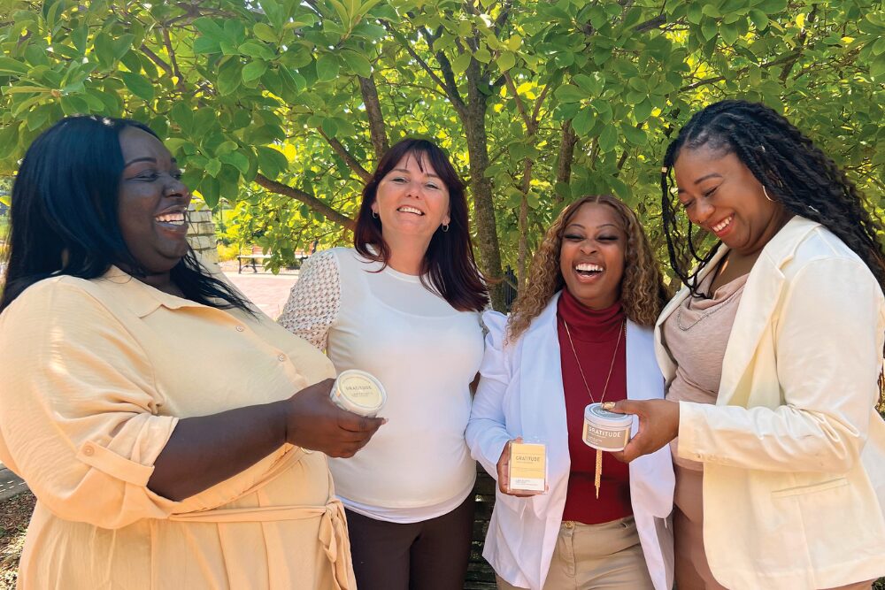 Shay Tolise with some of the other employees at Labyrinth Made Goods