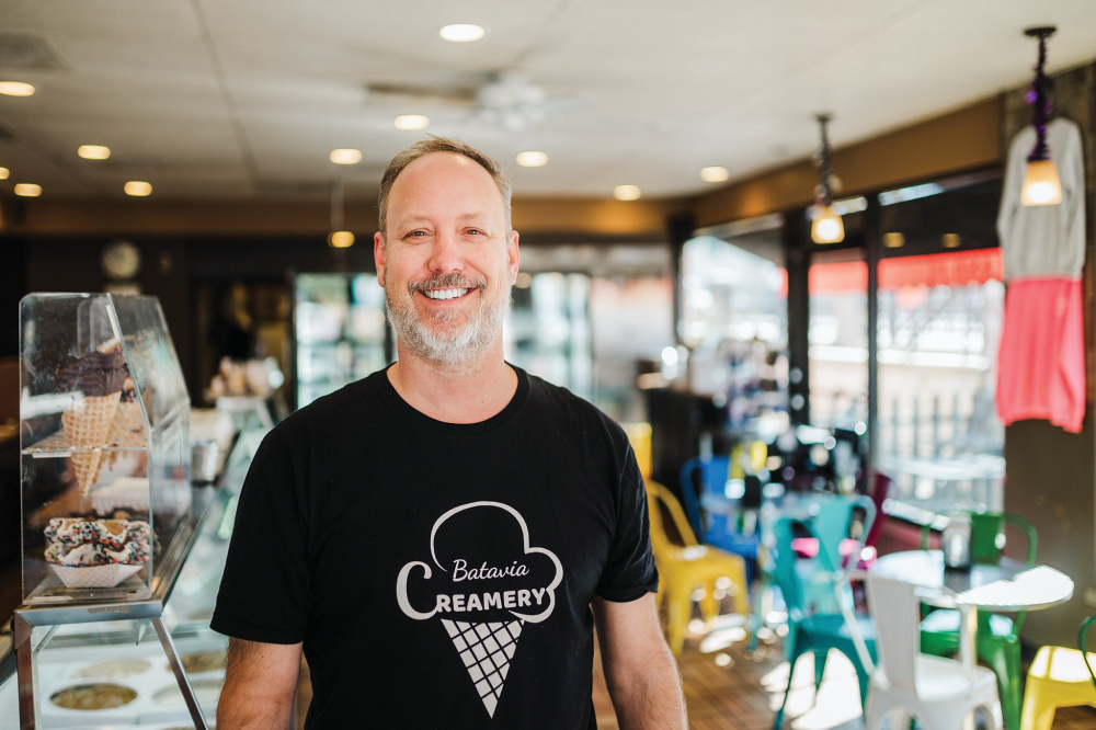 Employee in a Batavia Creamery shirt