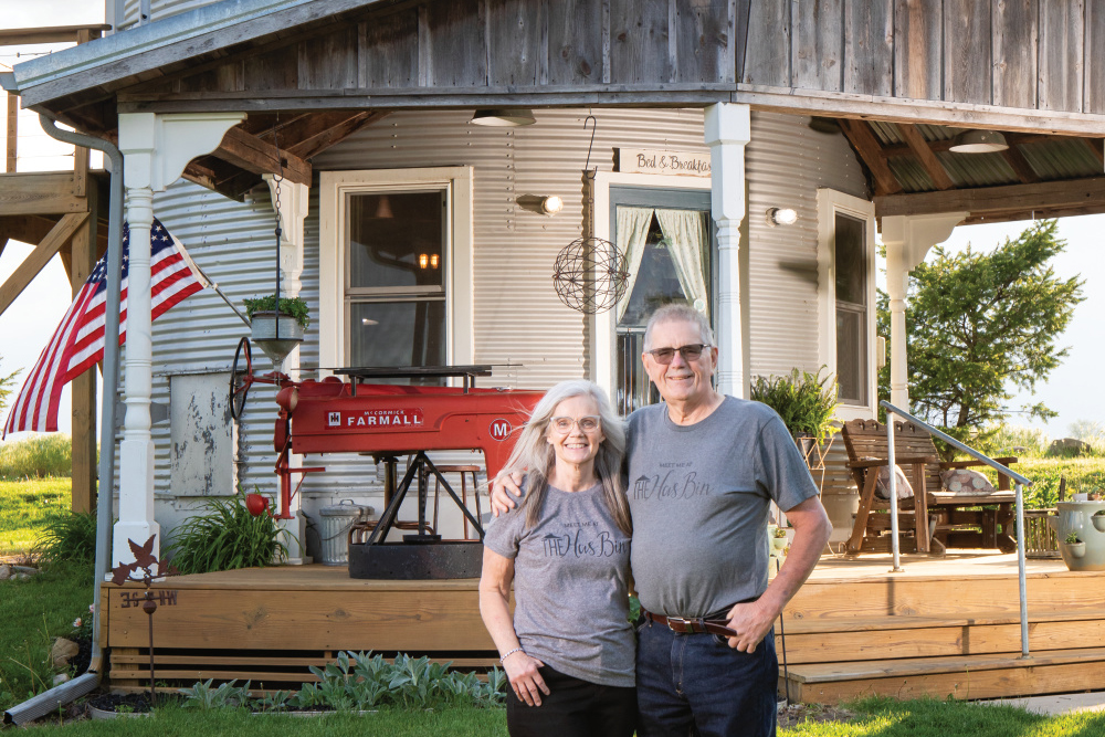 Mary and Stan Seaman standing outside their Has Bin Guest House farm stay 