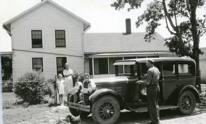 Black and white photo of customers back in the 1930s