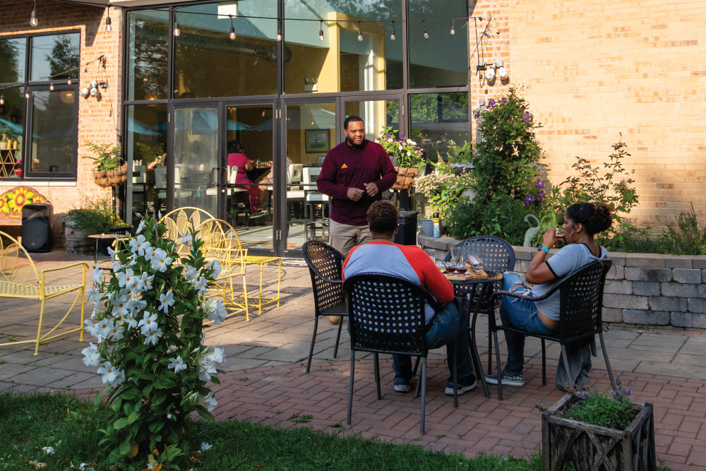 Patio area with people drinking mead at Wild Blossom Meadery