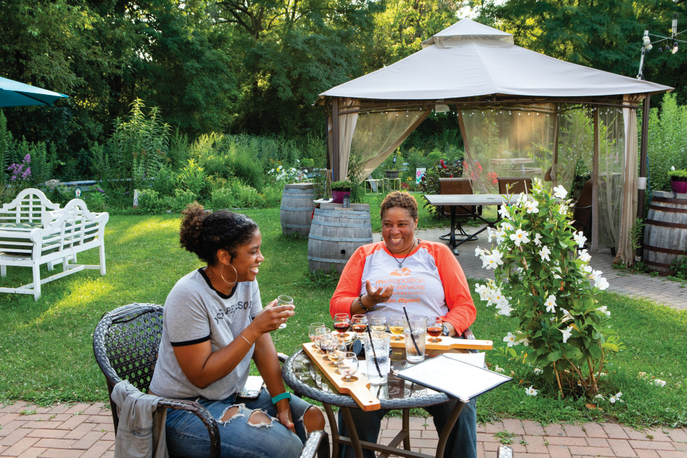 Women enjoying mead at Wild Blossom Meadery