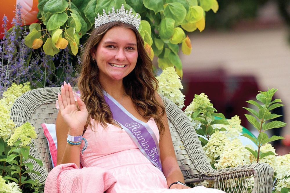 Dixon Petunia Festival pageant winner waves to the crowd