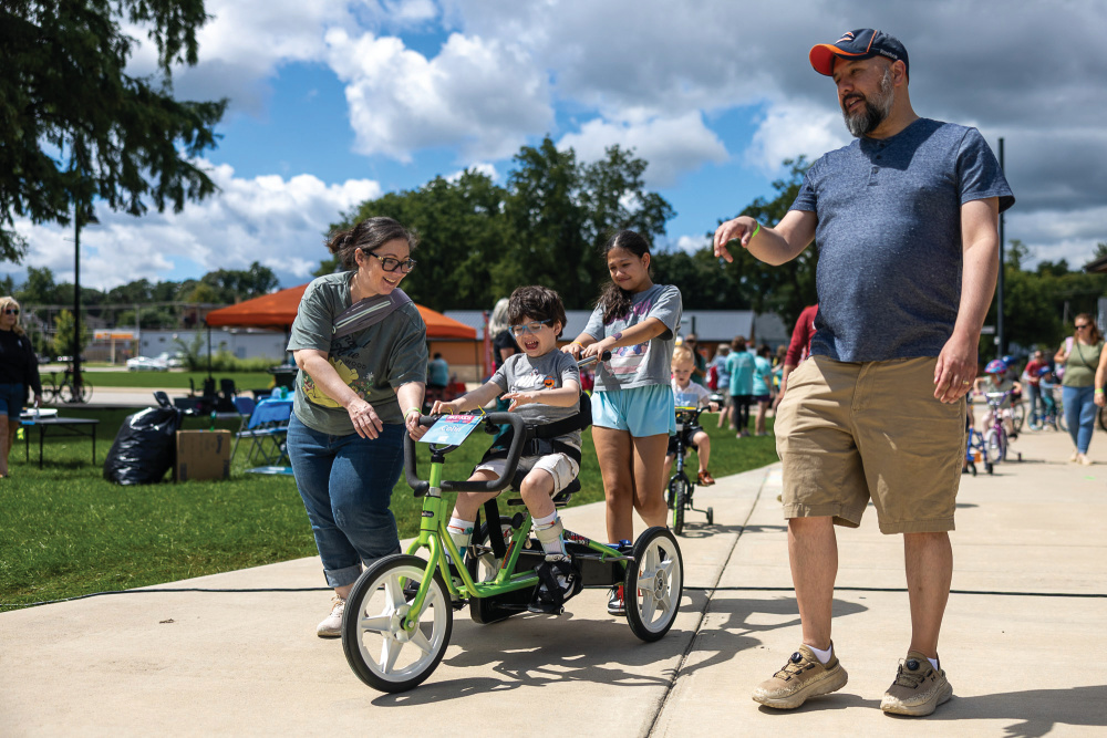 A family at Ride to Thrive: Bike for the Kids