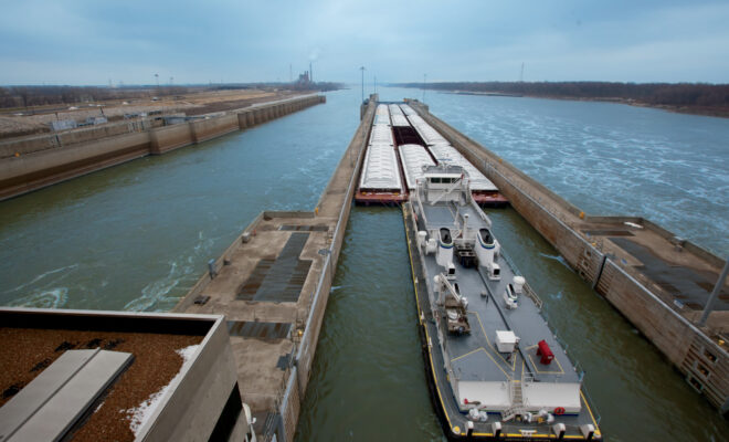 A barge is docked at the Melvin Price Locks and Dam in Alton, Illinois.