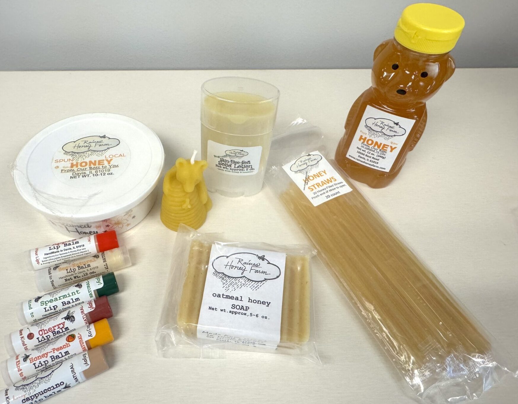Raines Honey Farm products - beeseax lip balm, soap, candles, honey straws, honey