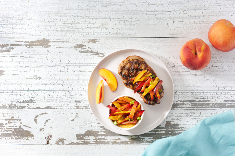Grilled Pork Chops with Summer Stone Fruit Slaw