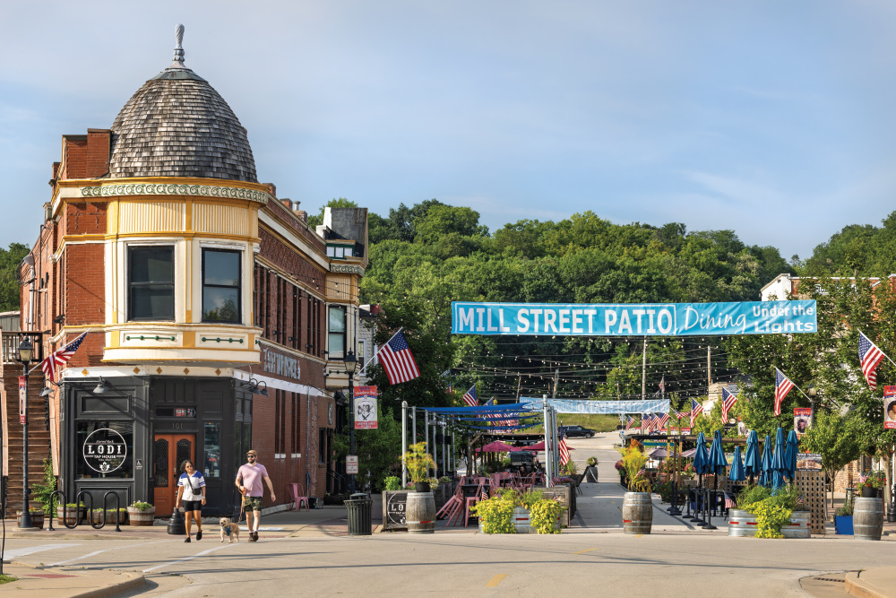People walking around Mill Street in the heart of downtown North Utica, one of the reasons to visit LaSalle County