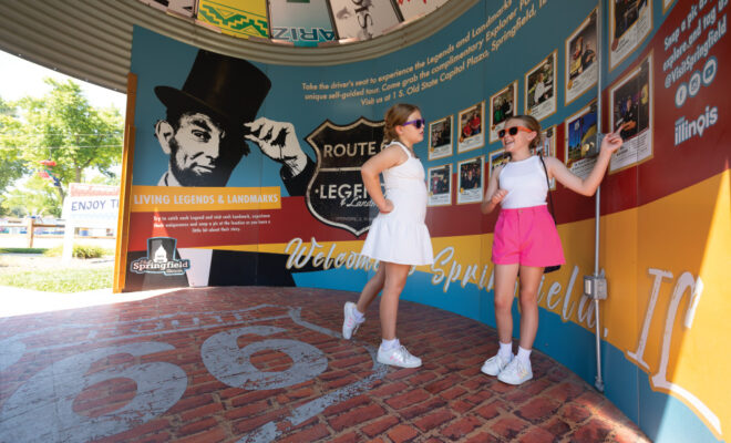 Two young girls enjoying the Illinois Route 66 Experience at the Illinois State Fairgrounds