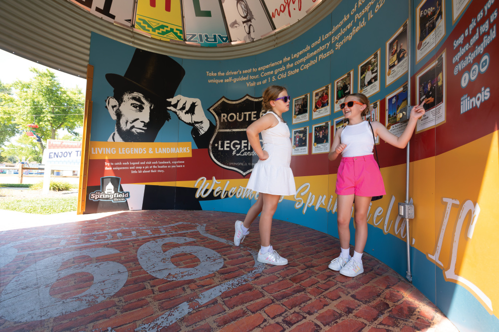 Two young girls enjoying the Illinois Route 66 Experience at the Illinois State Fairgrounds