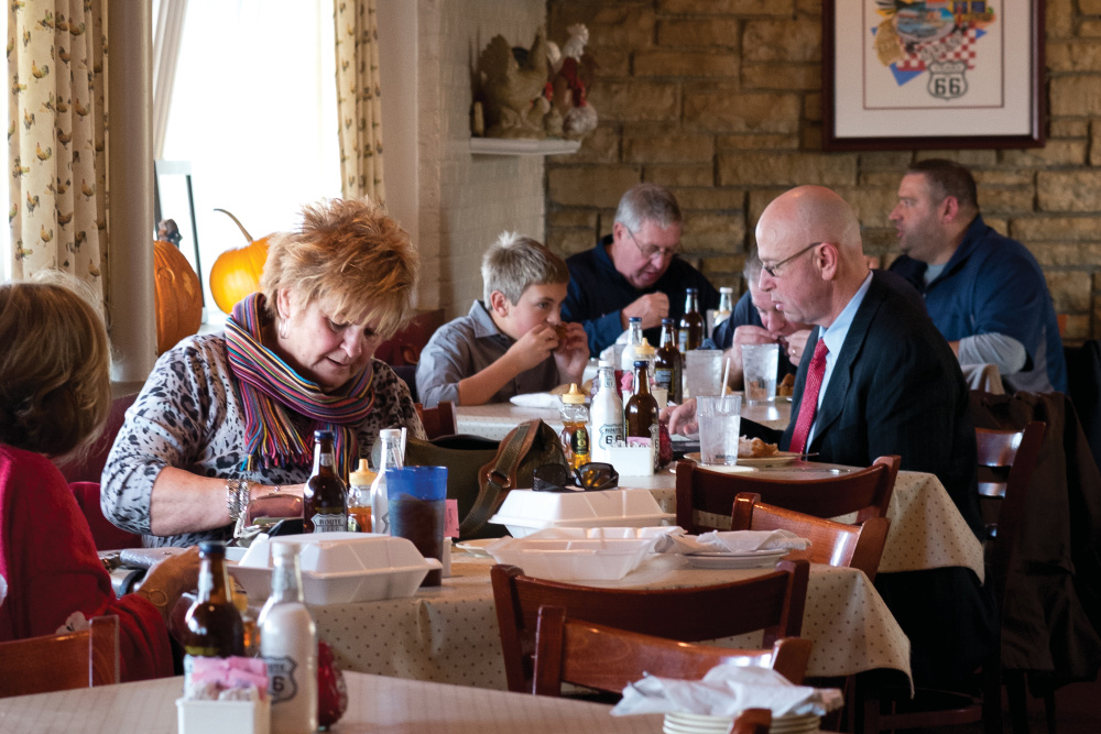 A couple eating at Dell Rhea’s Chicken Basket