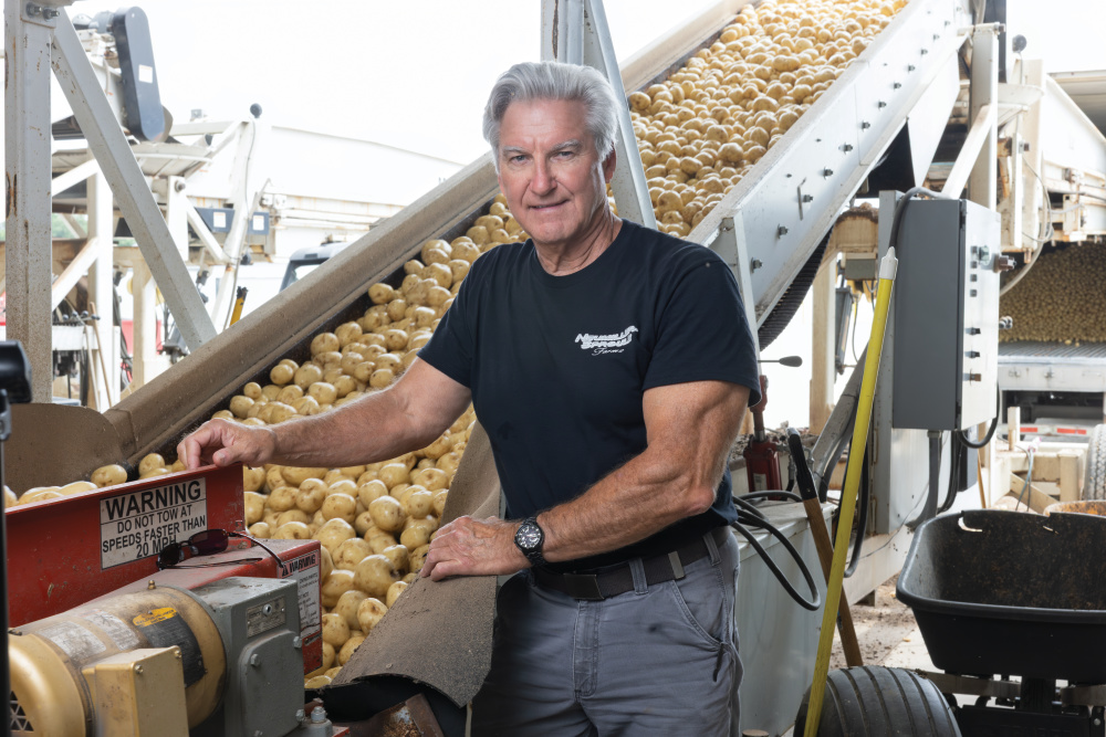 Paul Sproule sorting potatoes at the Bath farm location